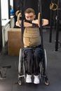 Man in Blue Denim Jeans Sitting on Black Wheel Chair