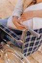 Woman in White Dress Sitting on Wheelchair