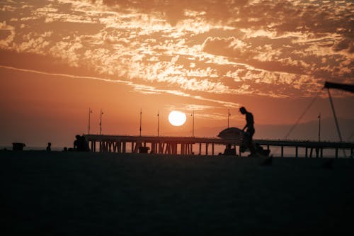 Silhouette Wooden Dock on the Beach 