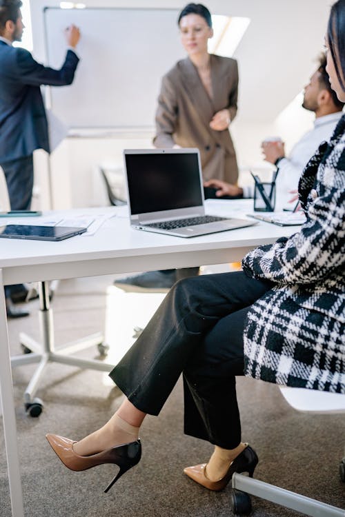 Free Colleagues Working and  Brainstorming Inside an Office Stock Photo