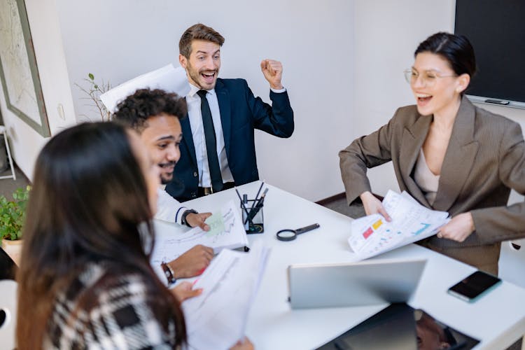 Happy Employees Inside The Meeting Room