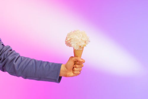 Close-Up Shot of a Person Holding an Ice Cream