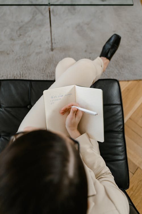 A Woman Taking Notes