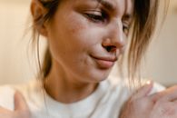Woman in White Crew Neck Shirt