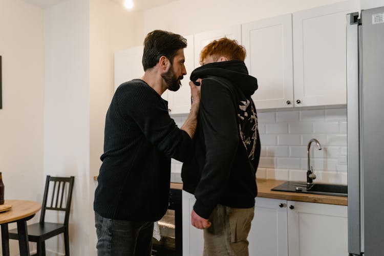 Men Fighting In The Kitchen