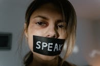 Woman With Black Tape on Her Lips