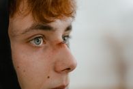 Womans Face in Close Up Photography