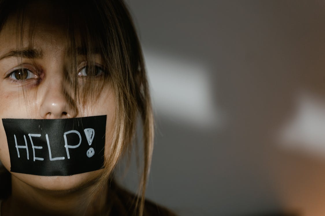 Woman With Brown Hair Covering Her Face