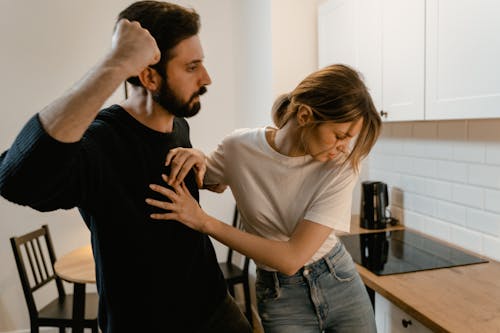 Free A Man Showing Aggression to a Woman Stock Photo