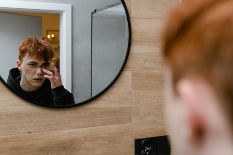 Reflection Of A Boy In The Round Mirror 