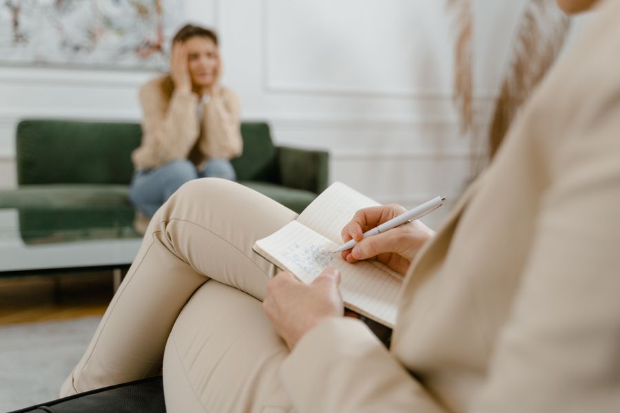 Psychologist writing an autism evaluation report in Ogden Utah
