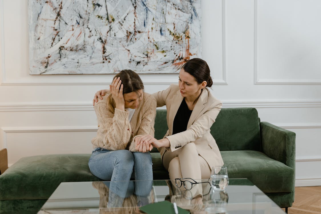 Two people engaged in a therapy session