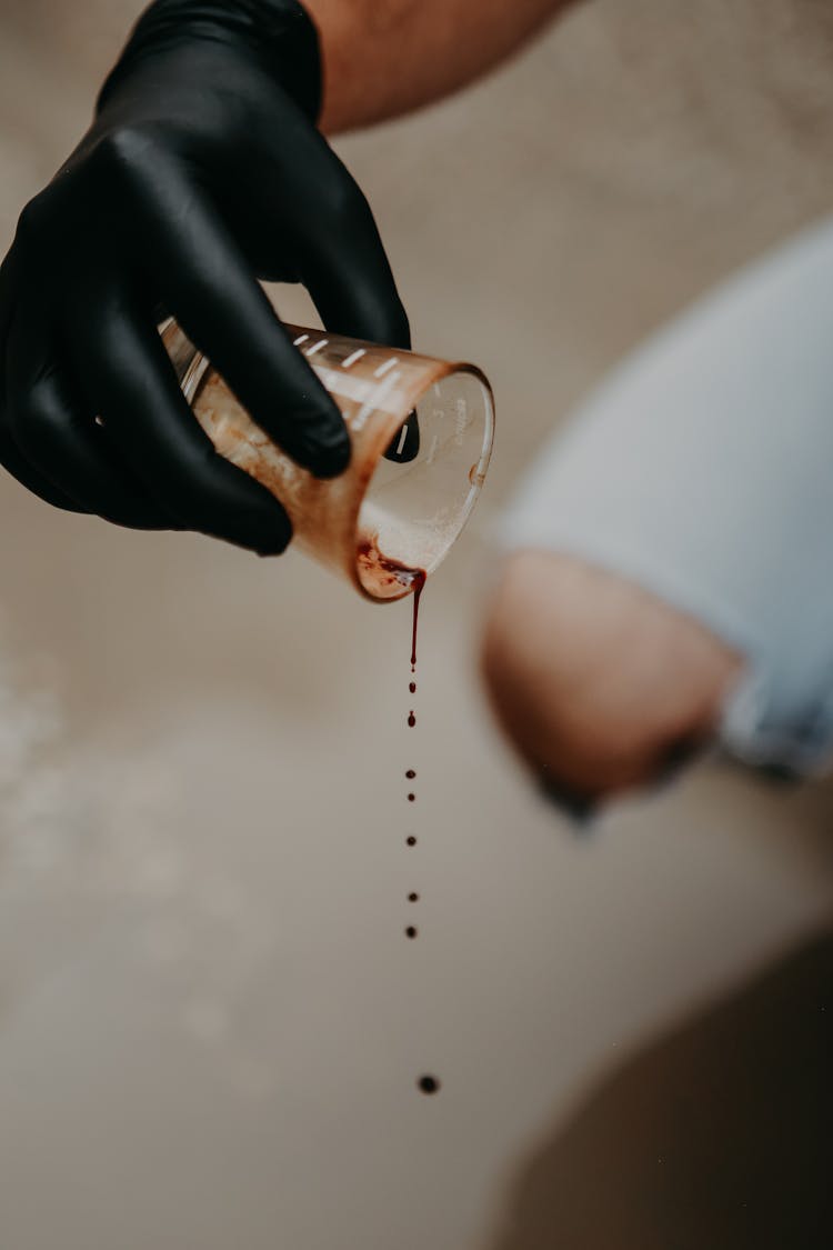 Photo Of Coffee Dripping From A Glass