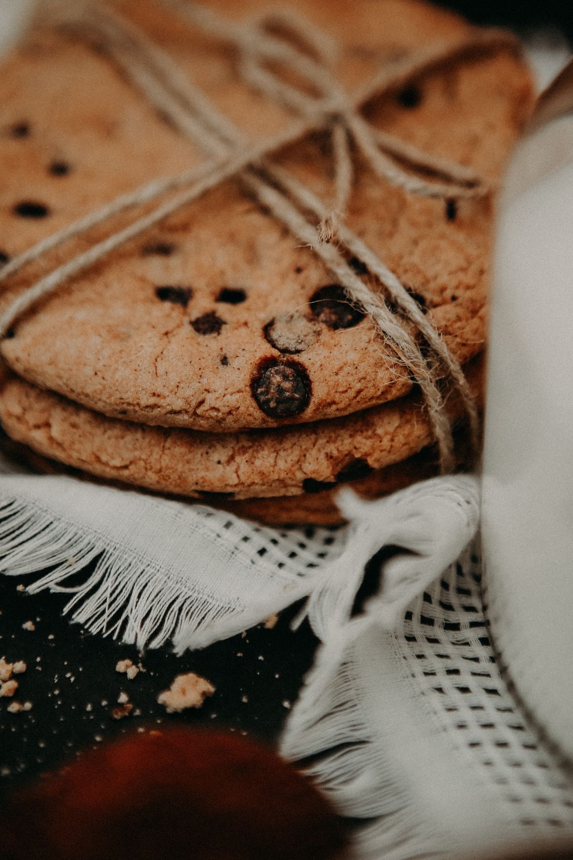 Rustic chocolate chip cookies tied with natural string.