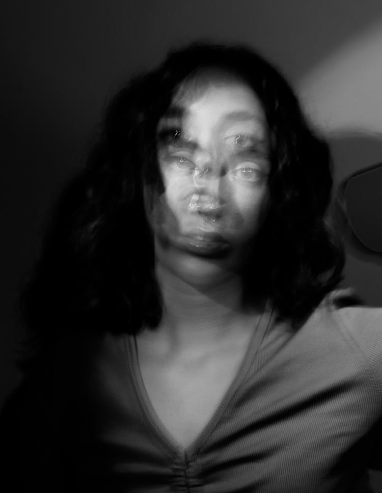 Blurred Portrait Of Brunette Woman