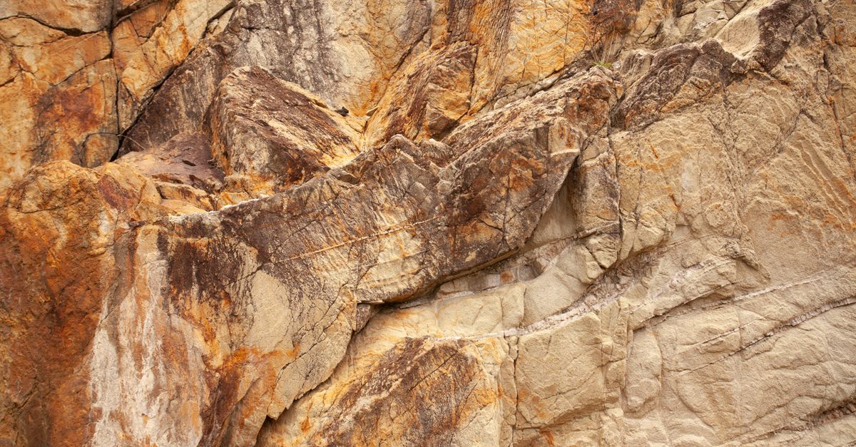 Close Up Shot Of Brown Rock Formation · Free Stock Photo