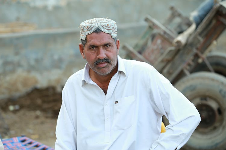 Elderly Man Wearing White Long Sleeves