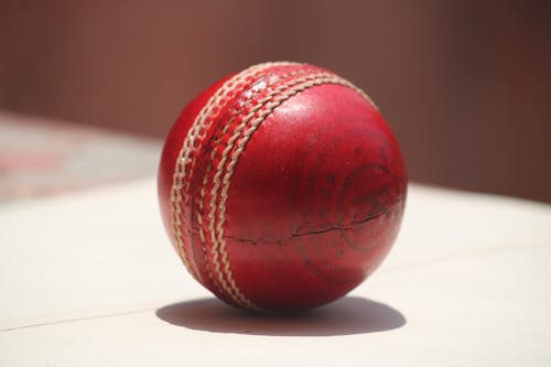 Free Close Up Photo of Leather Cricket Ball Stock Photo