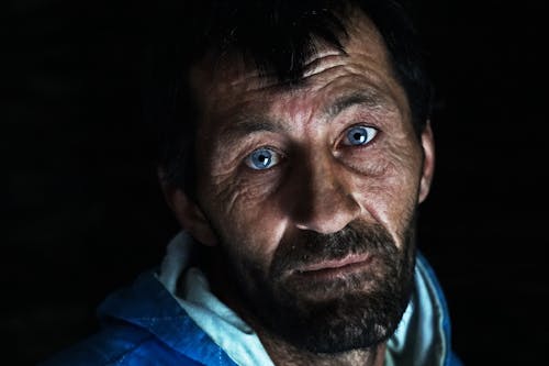 A Close-Up Shot of a Bearded Man