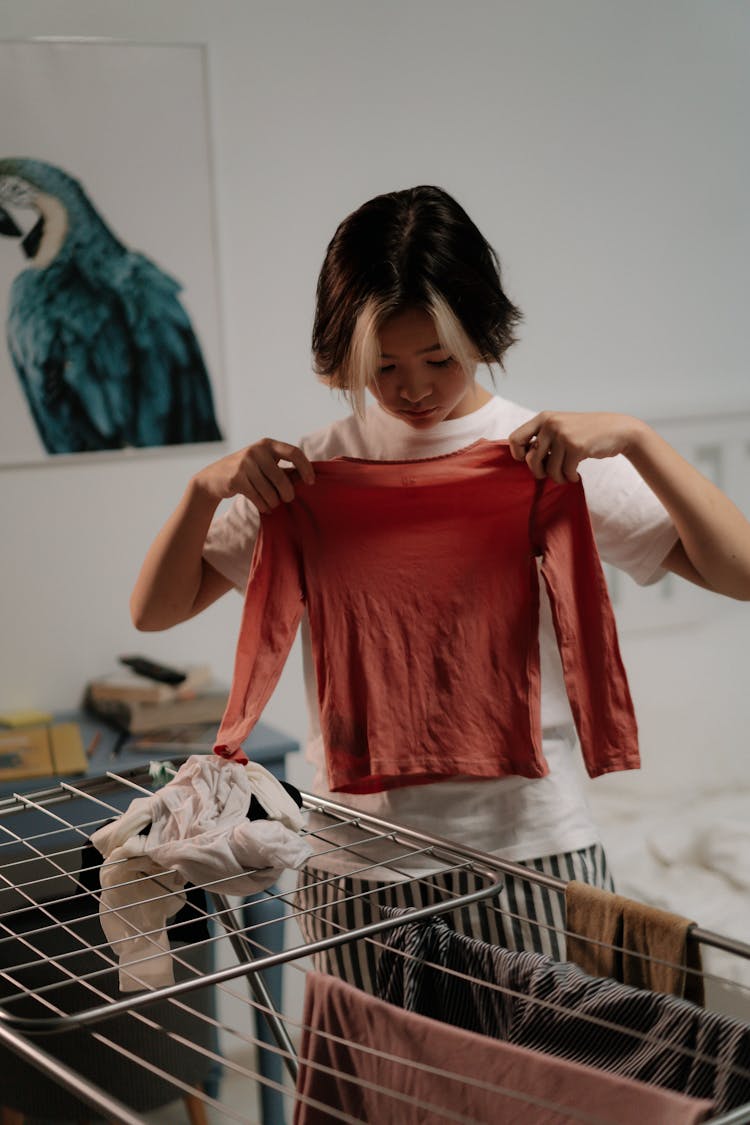 Woman Hanging Clothes