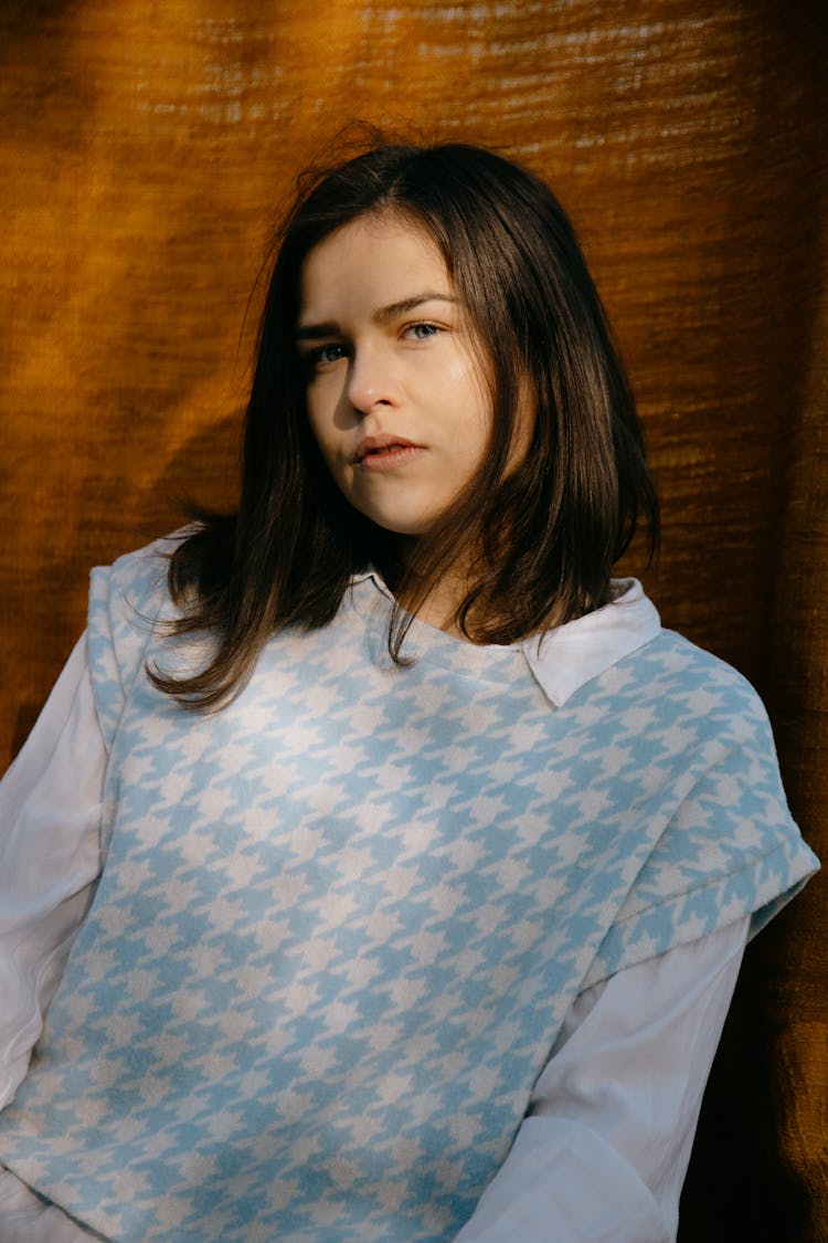 Woman In Blue And White Hounds Tooth Check Sweater