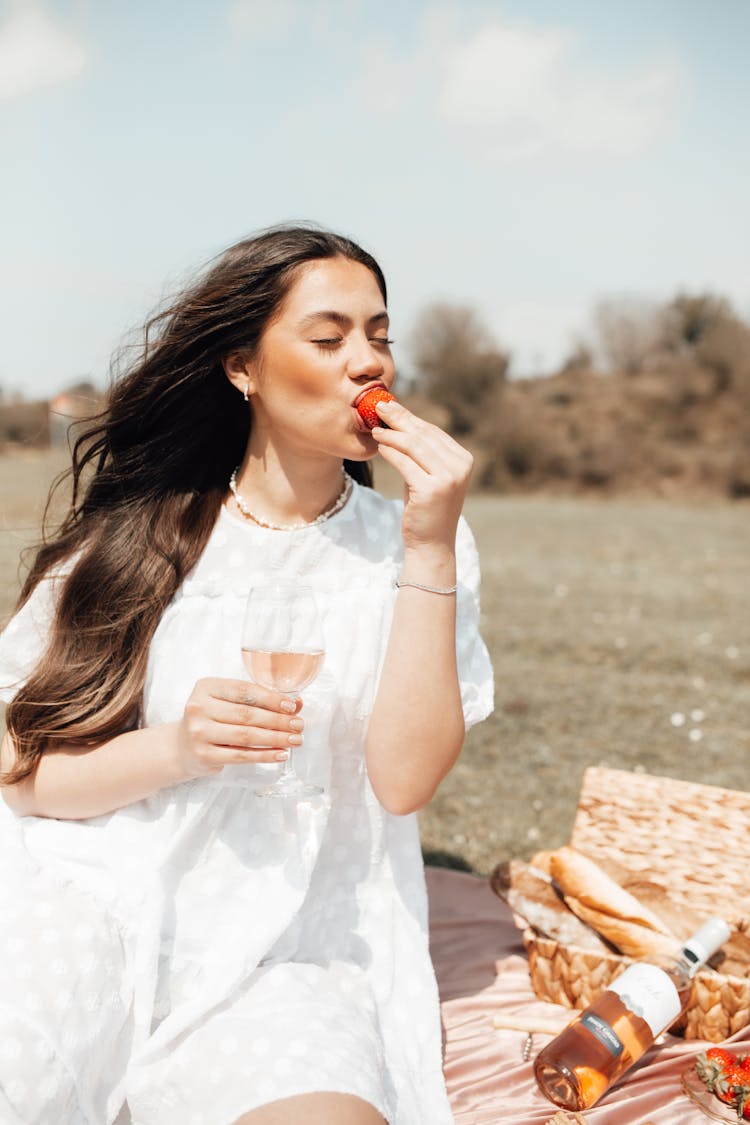 Woman Eating Strawberry