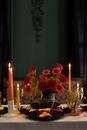 Table Setting With Lighted Candles and Flowers