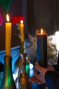 Close-Up Shot of a Person Holding a Lighted Candle