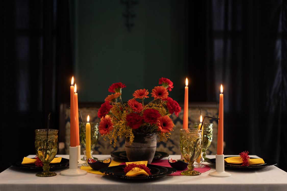 Table Setting With Lighted Candles and Flowers · Free Stock Photo