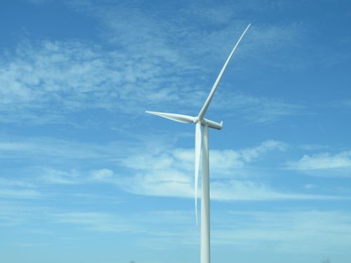 Free A wind turbine under a clear blue sky in Bo-Karoo, promoting renewable energy solutions. Stock Photo
