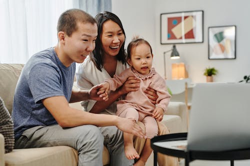 Free A Family Having a Video Call Stock Photo