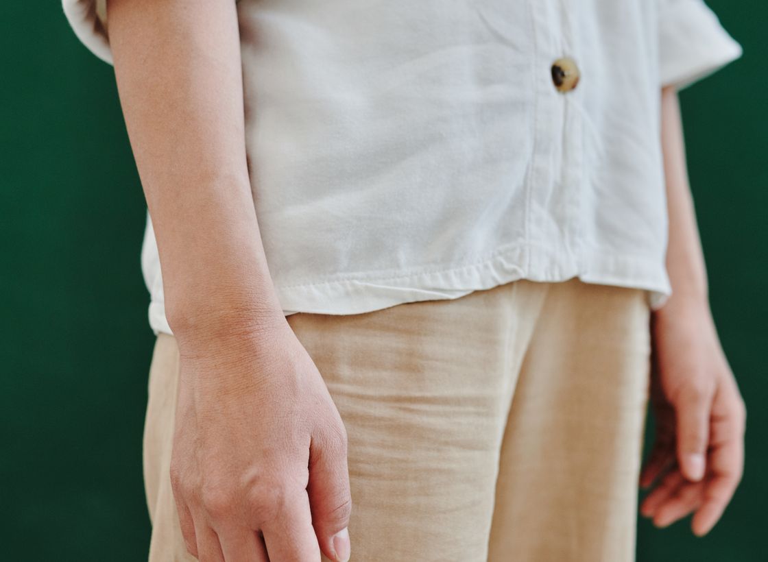 Polished wardrobe details and neutral styling