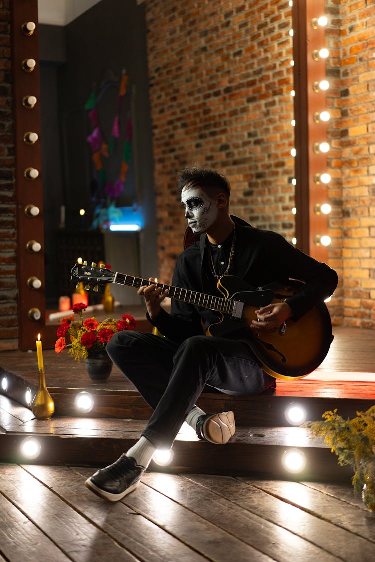 A Man Playing Guitar For The Day Of The Dead