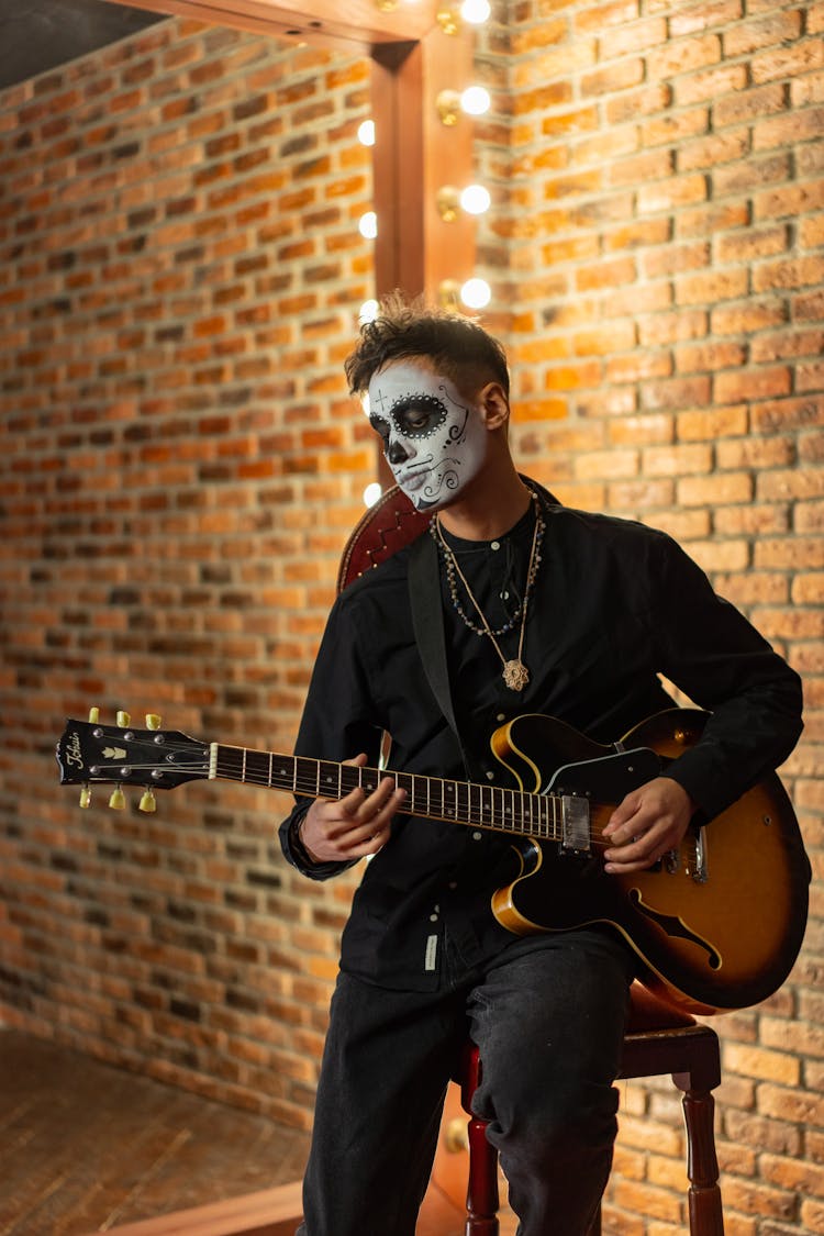 A Man Playing Guitar For The Day Of The Dead