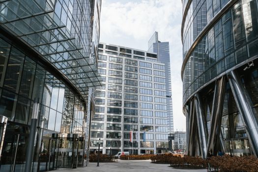 Contemporary skyscrapers in Warsaw's cityscape highlighting modern architectural design.