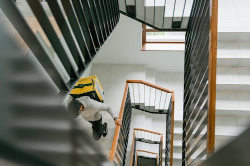 Man Going Up the Stairs