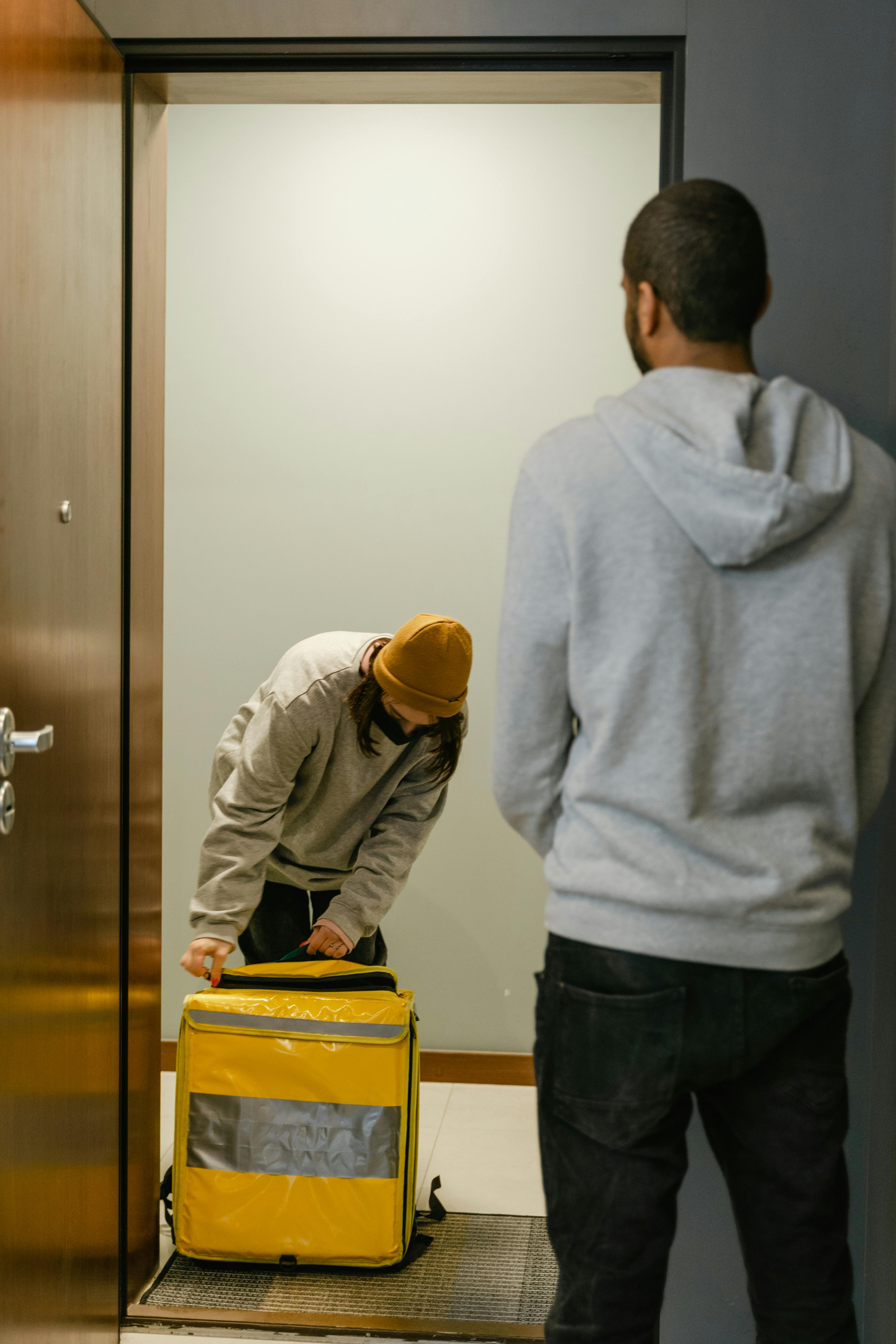 deliveryman standing at the door