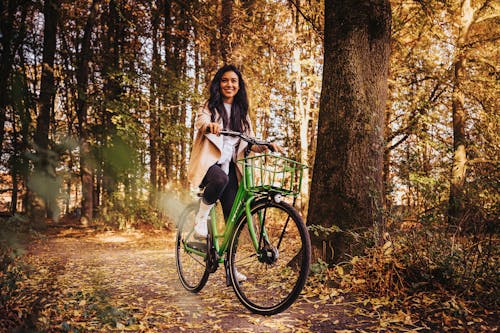 Girl Riding a Bicycle · Free Stock Photo