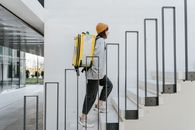 Person Going Up the Stairs