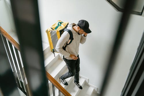 Man Going Down the Stairs