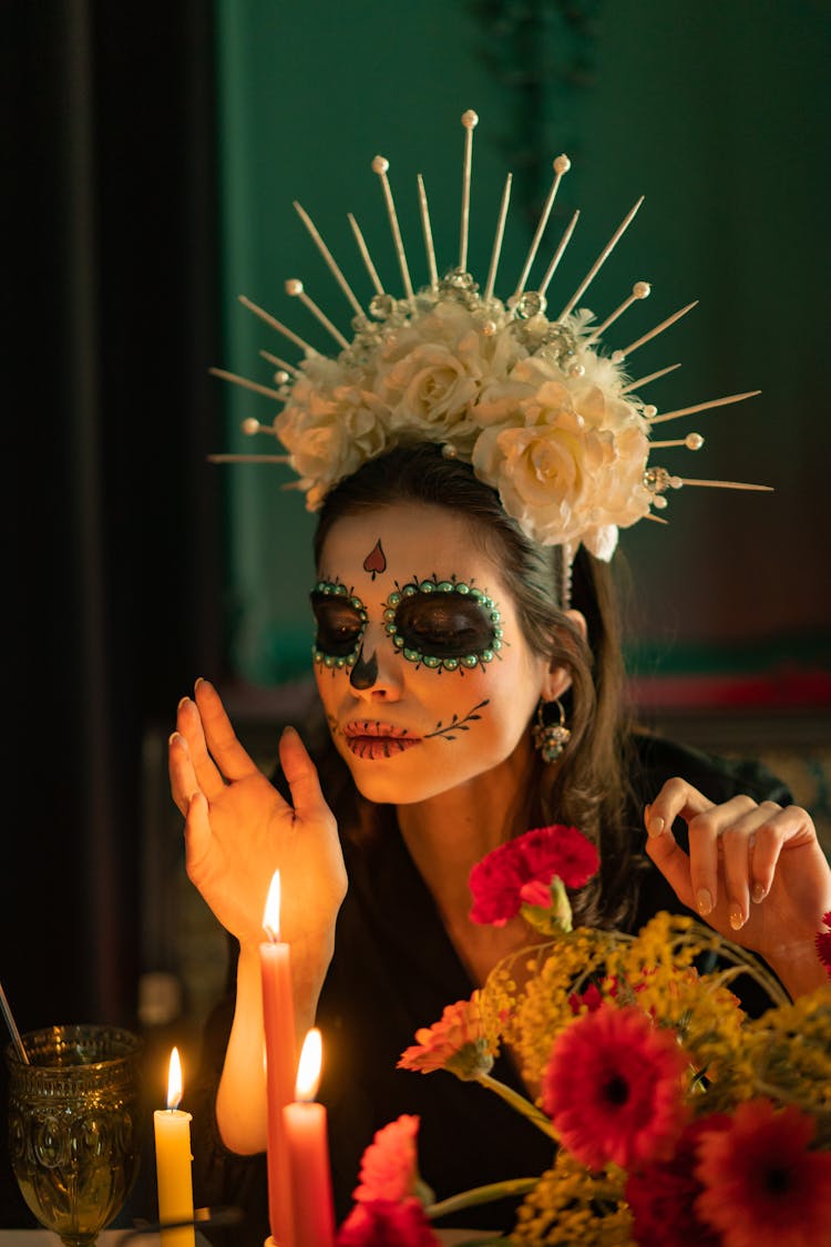 Woman With Skeleton Make Up And White Floral Headdress