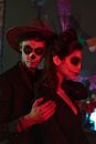 Couple in Halloween Skeleton Make Up