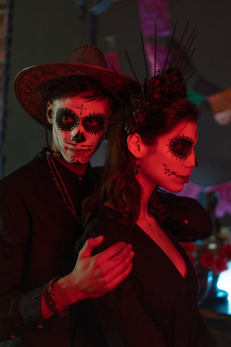 Couple In Halloween Skeleton Make Up