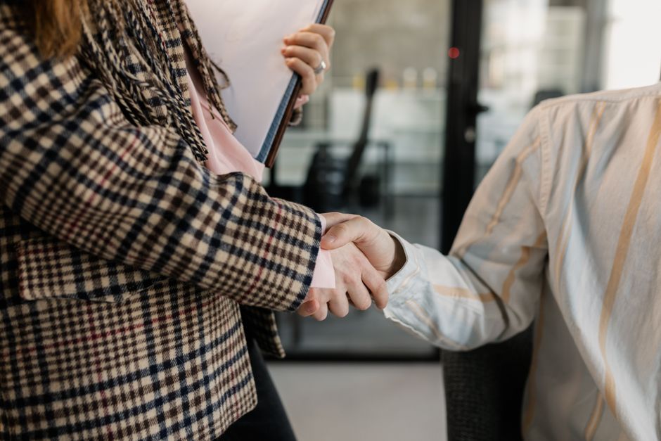 freelancer and business person handshake contract agreement