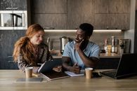 Man and Woman Sitting at Table