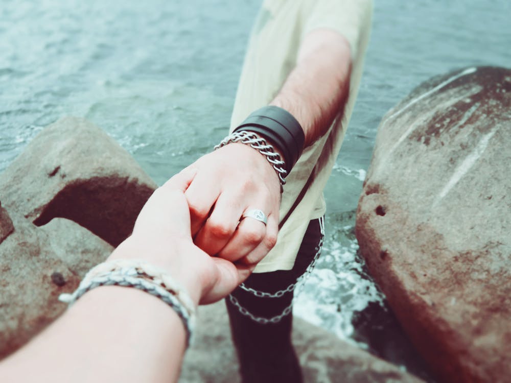 Free Two Person Holding Hands Stock Photo