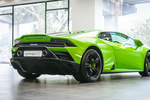 A striking green Lamborghini Huracan EVO parked in a modern showroom, showcasing luxury car design.