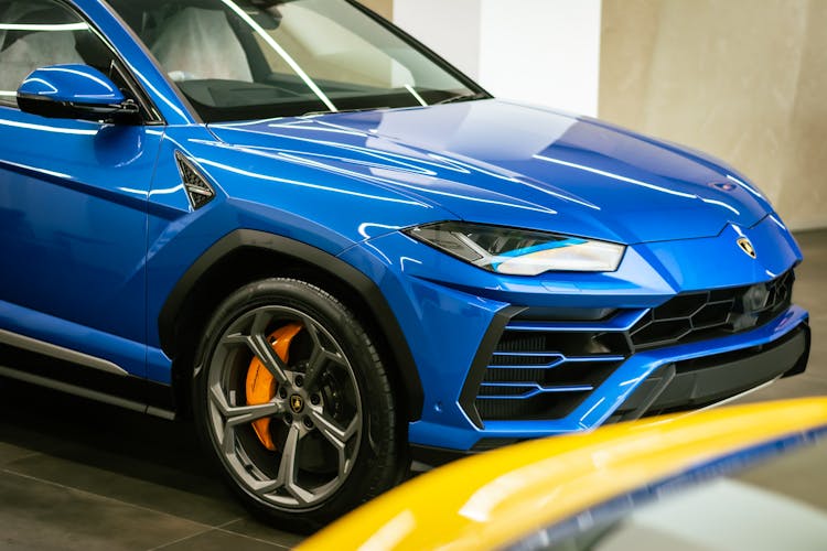 Blue Lamborghini Parked In Showroom
