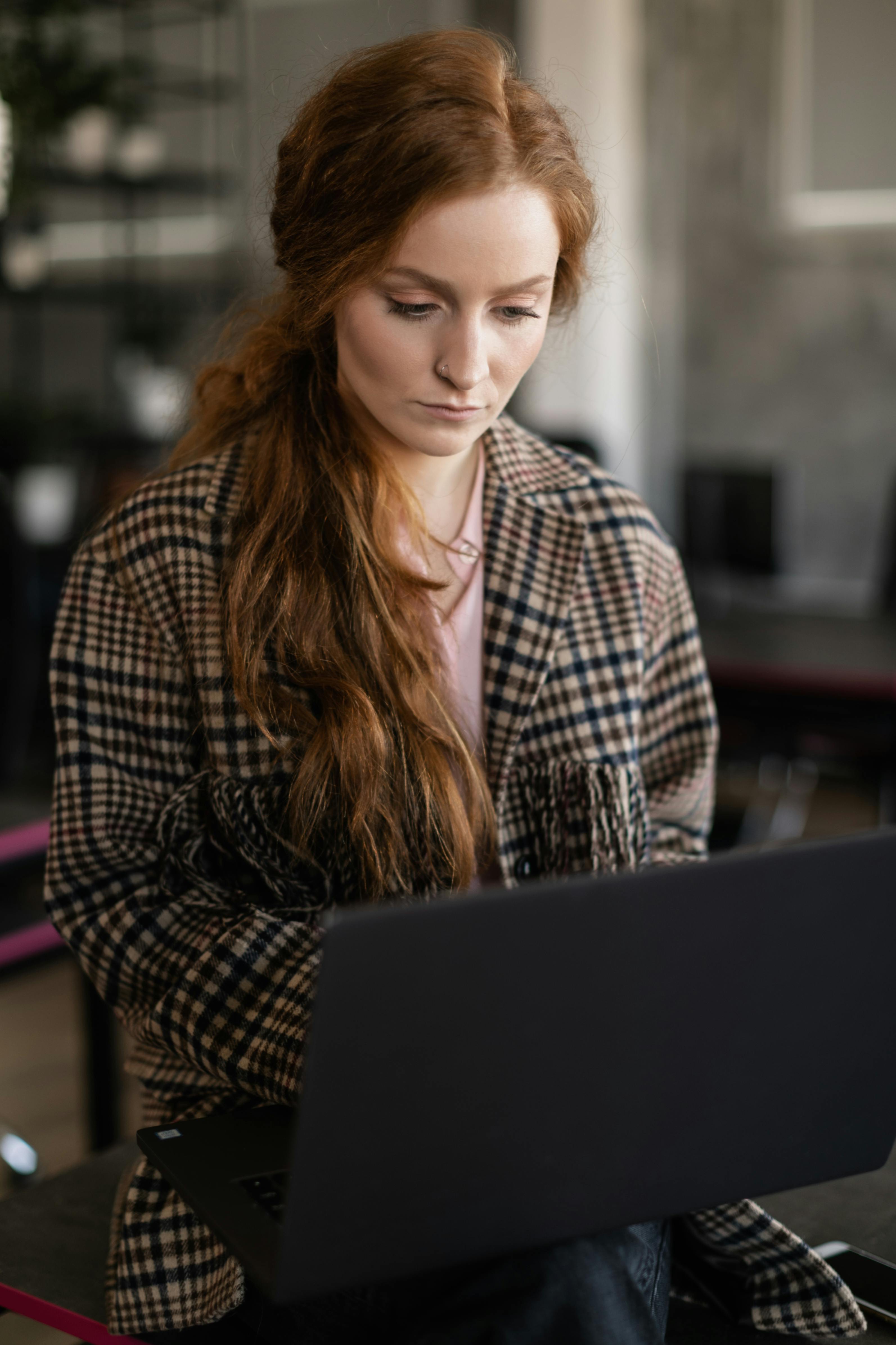 a woman using her laptop