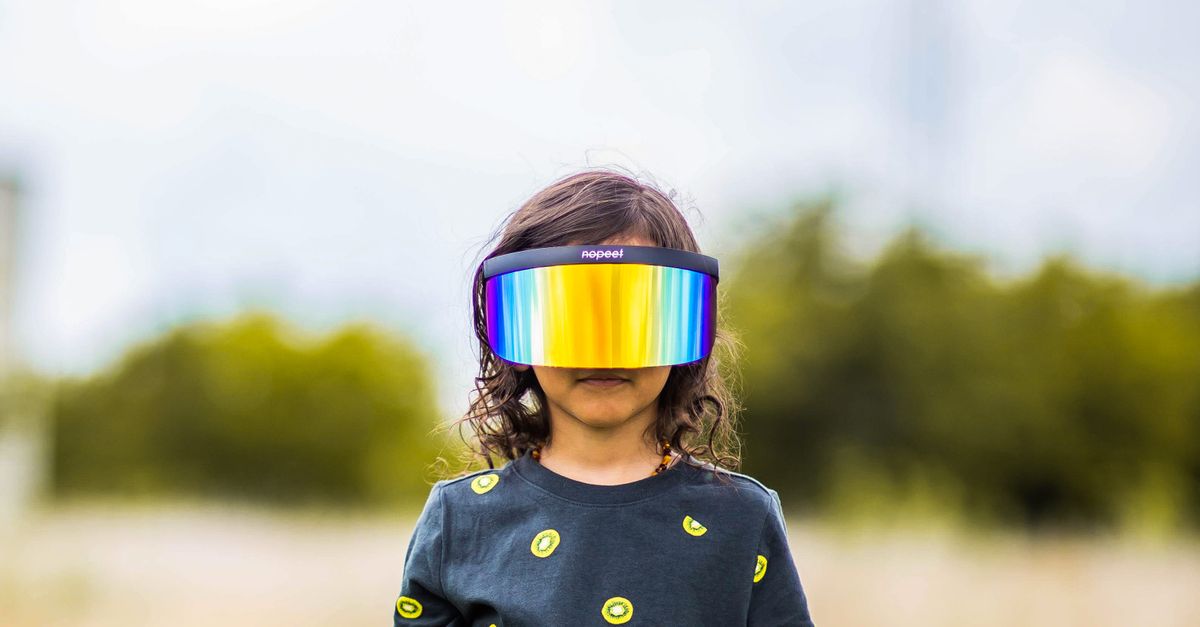 Child in polarized mask in countryside · Free Stock Photo